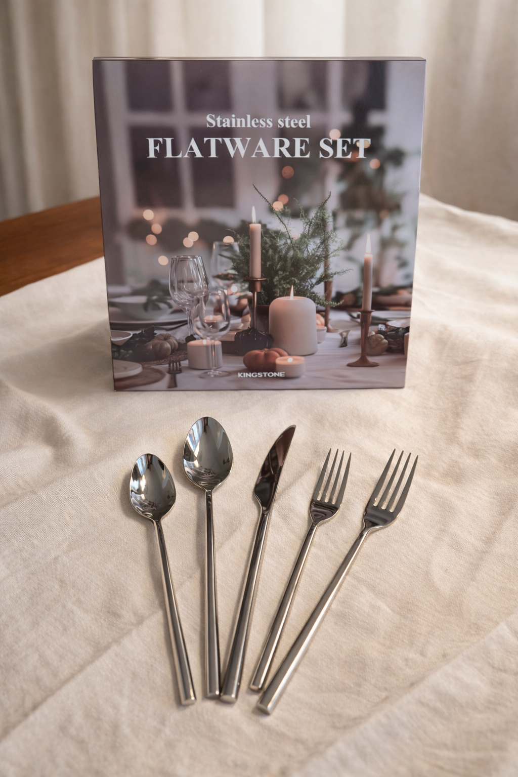 Organized collection of fine china with gold rimmed plates and teacups in luxury home cabinet
