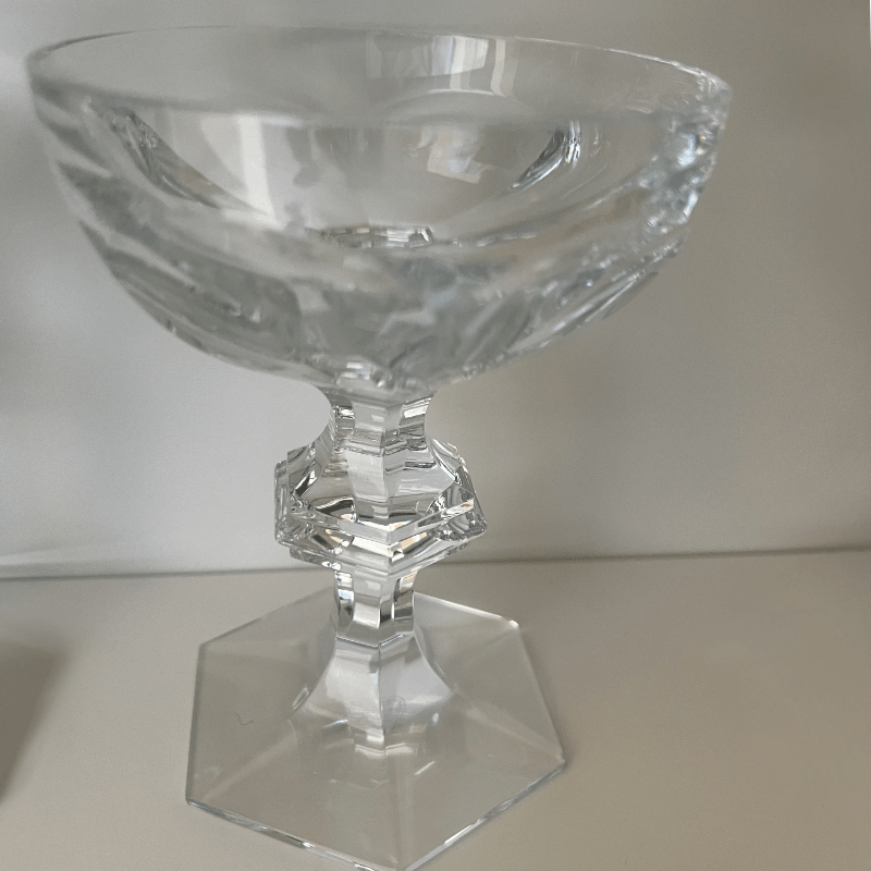 Crystal coupe glass with geometric base showing vintage alternative to champagne flute for cocktail entertaining
